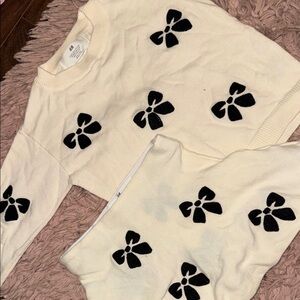 Girl’s Cream Sweater with Black Floral Design. Never Worn